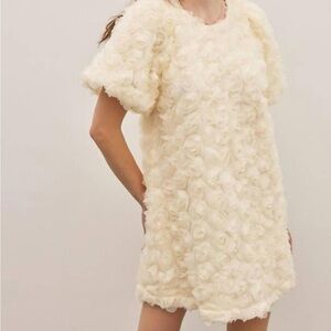 New with tags. Classy Cream Floral Mini Dress size medium.